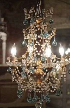 a chandelier with several lights hanging from it