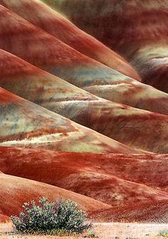 an image of some hills that are very colorful