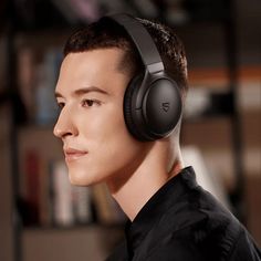 a man with headphones on his ears