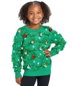 For the days before they’re ready to take on decking out their entire room, we bring you insanely decked out Christmas sweaters. There’s a whole lot less surface area, and a whole lot less work - behold! The Girl's Gaudy Garland Ugly Christmas Sweater. This one’s even better than bedroom decor – it’s decor you can wear anywhere. Family Christmas Sweaters, Funny Ugly Christmas Sweater, Ugly Christmas Sweater Vest, Kids Christmas Sweaters, Christmas Sweater Vest, Tipsy Elves, Tree Sweater, Girls Christmas Outfits, Ugly Christmas Sweater Funny