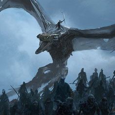 a large group of people standing in front of a giant dragon