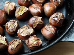 peeled chestnuts in a cast iron skillet