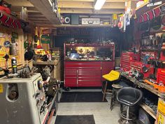 a garage filled with lots of tools and equipment