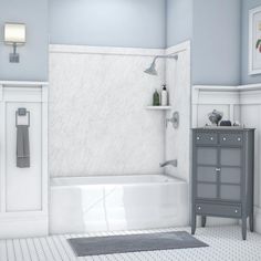 a bathroom with blue walls and white tile on the floor is shown in this image