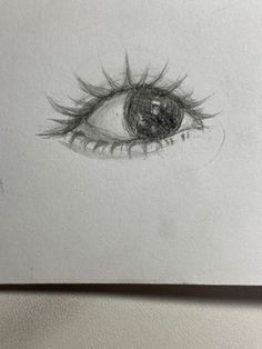 a pencil drawing of an eye