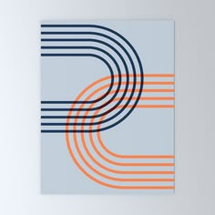 an orange and blue abstract art piece on a white wall