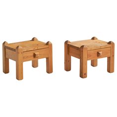 two small wooden stools sitting next to each other