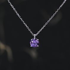 Amethyst Purple CZ Pendant Necklace  in Sterling Silver, Available in Two Sizes, 0.5 carat or 1 carat, Amethyst Purple Zircon Necklace. Dimensions : 40+5cm extension chain.  Materials and Care: These are made of sterling silver and coated with precious metal Rhodium. They are hypoallergenic. They are tarnish resistant but please keep in a sealed plastic bag when not wearing.  Packaging: All our jewellery comes with our branded velvet bag so your item is ready to be gifted.    Production Method: Zircon Necklace, Cz Pendant, Amethyst Purple, Purple Stones, Velvet Bag, Simple Necklace, 1 Carat, Quality Jewelry, Etsy Australia