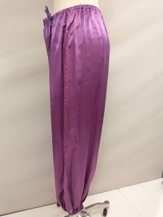 "Fun harem style pants in a vibrant purple color, perfect for a Halloween costume or a holiday party. Vintage 80's. Fabric is good quality and opaque. Light/mid weight, has alot of movement when walking. Please go by measurements. Condition very good, no stains or damage - although there is some fading, see photos. Length waist to hem 38.5\" Rise 13\" Waist 28-40\" Hips 60\" Inseam 27\" wt 8oz" 80's Costume, 80s Costume, Pants Vintage, Vibrant Purple, Purple Satin, Arabian Nights, Style Pants, Adult Costumes, Holiday Party