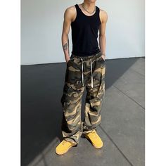 Model is 5ft 9''(176cm) tall, 145 lbs(66kg) weight and wearing a size L168cm 59kg wearing a size M - CAMO - Cargo style- Side pocket- Drawstring- Adjustable ankle- Wide straight fit Camouflage Straight Leg Bottoms For Streetwear, Straight Leg Camouflage Bottoms For Streetwear, Casual Camouflage Parachute Pants With Straight Leg, Casual Camouflage Straight Leg Parachute Pants, Full Length Camouflage Bottoms For Streetwear, Camouflage Full Length Bottoms For Streetwear, Camouflage Baggy Straight Leg Parachute Pants, Urban Camouflage Wide Leg Pants, Baggy Camouflage Jeans For Streetwear