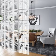 a room divider that has been cut into pieces to make it look like an intricate pattern