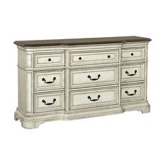 an old white dresser with drawers and handles on it's sides, against a white background