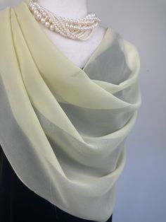 Elevate your style with our exquisite collection of chiffon shawls. Our chiffon shawls are the epitome of elegance and versatility, designed to effortlessly enhance your wardrobe and leave a lasting impression. Made from the fine poly chiffon fabric, these shawls offer a delicate and airy drape that adds a touch of grace to any outfit. Whether you're attending a special occasion, a casual gathering, or simply want to elevate your everyday look, our chiffon shawls are the perfect accessory. Choos Elegant Evening Dupatta In Traditional Drape, Elegant Evening Dupatta With Traditional Drape, Elegant Cream Dupatta For Wedding, Cream Shawl Scarf For Wedding, Elegant Silk Scarves In Traditional Drape, Elegant Silk Scarves With Traditional Drape, Elegant Sheer Silk Chiffon Dupatta, Elegant Cream Silk Dupatta, Elegant Silk Chiffon Dupatta For Wedding