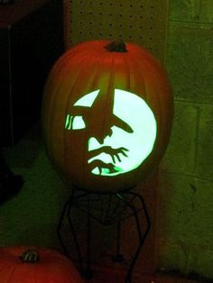 a pumpkin with a face carved into it