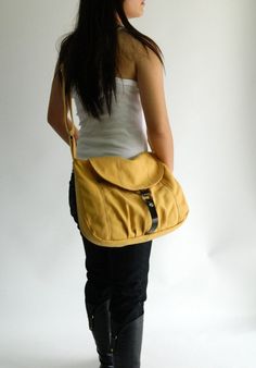 "One of our lightest designs, no. 103 is also loved by college students, travelers, and travel-to-work people. Made from eco-friendly fine canvas, this versatile bag works best as a shopping bag, weekender for women, and diaper bag. Featuring a semi-circular flap for a more feminine touch, no. 103 Claire also comes in many pockets to better organize your essentials but maintains lightweight. ►WHAT MAKES NO.103 CLAIRE OUTSTANDING * zipper closure to main compartment (anti-theft) * Handy front pou Yellow Travel Shoulder Bag Backpack, Yellow Shoulder Bag With Zipper Pocket For Everyday Use, Modern Shoulder Bag With Leather Handles For School, Yellow Bag With Zipper Pocket For Everyday, Travel Satchel With Adjustable Strap In Yellow, Yellow Satchel With Adjustable Strap For Travel, Travel Satchel With Yellow Leather Handles, Yellow Travel Satchel With Leather Handles, Travel Yellow Satchel With Leather Handles