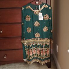 Beautiful Suit By Ethnic By Outfitters Full Of Sequins, Zari And Embroidery. Perfect For The Festive Season. Size Xs. This Suit Includes Shirt, Slip And Boot Cut Trouser. There Is No Dupatta With This Suit. This Suit Did Not Come With A Dupatta. Shirt Is Chiffon Pants And Slip Are Viscose Silk Material No Offers Please. Price Is Discounted Already And Free Shipping Has Been Applied Eid Sharara With Floral Embroidery For Traditional Ceremonies, Floral Embroidered Sharara For Eid And Traditional Ceremonies, Eid Sharara With Floral Embroidery, Bohemian Salwar Kameez With Dabka Work In Georgette, Bohemian Salwar Kameez With Intricate Embroidery, Bohemian Long Sleeve Salwar Kameez In Georgette, Green Bohemian Traditional Wear In Georgette, Bohemian Green Georgette Traditional Wear, Green Bohemian Georgette Traditional Wear