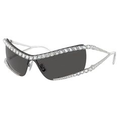 Edgy and extravagant, these bold sunglasses take inspiration from Swarovski’s Matrix family. The dark gray lenses are embellished with lines of prong-set clear crystals that wrap entirely around the top and bottom of the silver-tone frames. At each side, distinctive triangular temples create a look that exudes futuristic chic. Choose this pair when you really want to steal the spotlight. Swarovski Sunglasses, Gray Lenses, Steal The Spotlight, Cotton Gloves, Clear Crystals, Grey Lenses, Premium Brands, Green Crystals, Clear Crystal