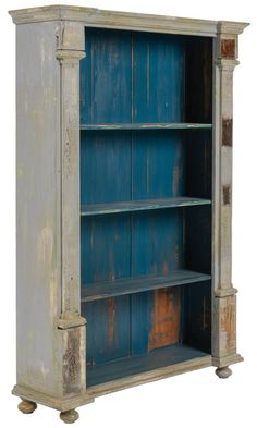 an old wooden bookcase with blue paint