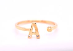 This ring makes a perfect gift for multiple occasions. Made to order in solid 14kt gold you can choose from yellow gold, white gold or rose gold when ordering. Studded with a lovely white diamond for that touch of sparkle. Minimalist in style this makes a simple statement. Get it in Mom's initial or with the letter M for a perfect Mother's Day gift. Perfect also for a promise ring or an engagement ring in your fiance's initial. This ring also makes a great gift for loved ones on birthdays and an Gold Initial Open Ring With Single Diamond, Gold Initial Ring With Single Diamond, Gold Open Ring With Single Diamond Initial, Gold Open Ring With Single Diamond, Initial Design, Gold Open Ring With Single Diamond, Adjustable Open Initial Ring For Formal Occasions, Adjustable 14k Gold Initial Open Ring, Formal Adjustable Initial Open Ring, Gold Open Ring Midi With Single Diamond