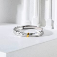 Confidently declare your love for her with this charming wedding band. Buffed to a brilliant luster, this wedding ring symbolizes your vow to honor and cherish her.Weight: 1.64 gWidth: 2.5 mmMaterial: 925 SilverPlating Color: Silver, Yellow Gold White Gold Simple Design Promise Jewelry, Simple White Gold Jewelry For Promise, Adjustable White Gold Bands For Promise Ring, Adjustable Promise Couple Rings With Round Band, Minimalist Wedding Rings For Valentine's Day, Adjustable Couple Promise Rings, Adjustable Open Band Couple Rings For Anniversary, Anniversary White Gold Ring With Simple Design, Elegant Wedding Band Gift