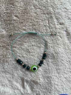 Beautiful Handmade Evil Eye Bracelet in Dark Green with Green Evil Eye. Use For Protection & Good Luck! Green Evil Eye, Handmade Evil Eye, Eye Bracelet, Evil Eye Bracelet, Evil Eye, Good Luck, Light Green, Dark Green, Jewelry Bracelets