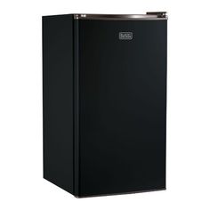 a black refrigerator freezer sitting on top of a white wall