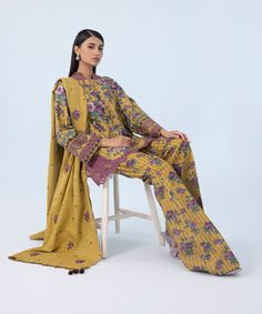 Sapphire U3PE-SG23V9-14 3 Piece Embroidered Khaddar Suit Winter Collection Printed Cambric Lawn Suit For Wedding, Unstitched Floral Embroidered Suits For Eid, Wedding Cambric Lawn Suit Printed, Yellow Cotton Salwar Kameez With Floral Print, Yellow Floral Print Lawn Suit For Eid, Printed Long Sleeve Unstitched Suit For Wedding, Festive Fitted Suit With Printed Motifs, Multicolor Floral Embroidered Long Sleeve Lawn Suit, Yellow Long Sleeve Sets With Printed Motifs