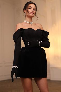 DESCRIPTION: Off shoulder design Long sleeve and sweetheart neckline A-line design Velvet Mini length Model is wearing size small. Product Measurements  Top Length  Waist  Sleeve  Bust   Label Size  US Size  IN  IN  IN  IN   XS  2  24.41  26.38  17.72  33.07   S  4  24.80  27.95  18.11  34.65   M  6  25.20  29.53  18.50  36.22   L  8 -10  25.59  31.89  18.90  38.58      Product Measurements  Top Length  Waist  Sleeve  Bust   Label Size  US Size  CM  CM  CM  CM   XS  2  62  67  45  84   S  4  63  71  46  88   M  6  64  75  47  92   L  8 -10  65  81  48  98 Elegant Off-shoulder Mini Dress With Fitted Bodice, Elegant Dresses With Heart-shaped Neckline For Night Out, Elegant Dress With Sweetheart Neckline For Dinner, Elegant Sweetheart Neckline Evening Dress For Dinner, Elegant Evening Dress With Sweetheart Neckline For Dinner, Elegant Mini Dress With Sweetheart Neckline For Dinner, Elegant Mini Dress With Sweetheart Neckline For Banquet, Elegant Dinner Dress With Sweetheart Neckline, Elegant Party Dress With Heart-shaped Neckline