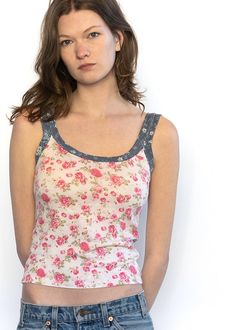 Add a pop of personality to your wardrobe with Pink Ditzy, the everyday tank that puts a fresh spin on a classic style. Perfect for any occasion, this tank is anything but ordinary! Fitted Casual Camisole For Daywear, Chic Cotton Scoop Neck Tank Top, Trendy Everyday Tank Top, Feminine Stretch Tank Top For Daywear, Casual Stretch Camisole For Daywear, Trendy Racerback Tops For Day Out, Summer Scoop Neck Tank Top For Layering, Cotton Scoop Neck Tank Top For Daywear, Stretch Cotton Tank Top For Daywear