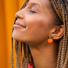 small orange earrings on model Fun Orange Drop Earrings, Casual Orange Earrings, Hand Painted Adjustable Orange Jewelry, Adjustable Hand Painted Orange Jewelry, Fruit Earrings, Orange Earrings, Mid Century Design, Post Earrings, Silver Gold