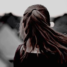 the back of a woman's head with long hair