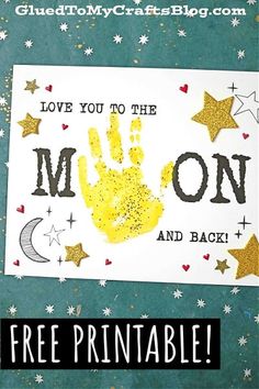 a handprinted card with the words love you to the moon and back on it