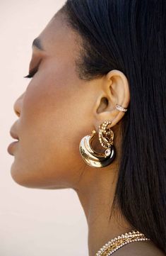 A chunky crescent design brings a contemporary twist to this pair of bold hoops plated in polished 18-karat gold. 1 1/4" hoop diameter 18k-gold plate Imported 90s Jewelry, Triple Hoop Earrings, Boho Hoop Earrings, Golden Hoops, Hoop Earrings Style, Keep Jewelry, Quality Jewelry, Crescent, Fashion Earrings