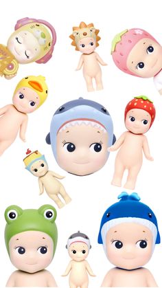 an assortment of baby dolls are shown in this image