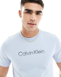 T-Shirts & Tank tops by Calvin Klein Your new go-to Crew neck Short sleeves Logo print Regular fit Calvin Klein Crew Neck T-shirt For Spring, Calvin Klein Logo Cotton Tops, Calvin Klein Cotton Logo Tops, Calvin Klein Cotton Tops With Logo, Calvin Klein Relaxed Fit Crew Neck T-shirt, Calvin Klein Logo Print Crew Neck T-shirt, Calvin Klein Logo Print Crew Neck Top, Calvin Klein Logo Print T-shirt For Streetwear, Calvin Klein Graphic Tee Crew Neck