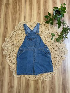 "Awesome pair of 90s Cherokee denim classic 90s shortalls overalls. Marked a size 16. Metal buttons at the hips. Adjustable straps. Pockets in the back. Classic and timeless style. So cute. In good vintage condition. Perfectly worn in. Showing signs of age and normal wash and wear. There is a very tiny spots on the right overall strap. See last picture. Measurements taken while item was laying flat. Bust: Can vary a bit due to the overall style. Waist: 19\" Hips: 23\" Length: 33.5\" Can be made Vintage Medium Wash Washed Overalls, Blue Fitted Vintage Overalls, Vintage Dark Wash Overalls, Vintage Medium Wash Denim Shortalls, Vintage Denim Blue Cotton Shortalls, Overalls Women, How To Make Shorts, Route 66, Metal Buttons