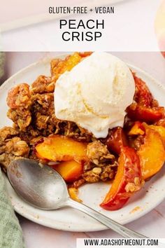 a close up of a plate of food with ice cream on top and peaches in the background