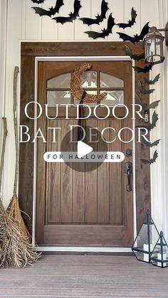 the front door is decorated for halloween with bats