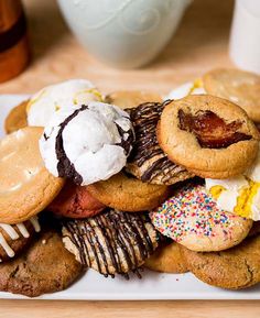 a white plate topped with cookies and ice cream