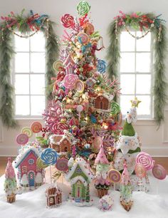 a christmas tree decorated with lollipops and candy