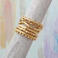 "Need the perfect stack ring set? These rings are unique to Toozy Studio - we created each design by hand with carved wax then had them cast in sterling silver and plated with 24k gold. Now it is up to you to take the styles you like and combine them to create a unique ring just for you! These rings are also available in SILVER: https://www.etsy.com/listing/482424383 ♥♥ HOW TO ORDER ♥♥ 1. SELECT HOW MANY RINGS YOU WANT IN THE DROP DOWN. 2. CHOOSE YOUR SIZE IN THE SECOND DROP DOWN. PLEASE NOTE: w Unique Handmade Stackable Yellow Gold Rings, Unique Handmade Yellow Gold Stackable Rings, Artisan Stackable Rings For Anniversary, Artisan Stackable Adjustable Rings, Stacking Gold Rings, Brushed Gold Ring, Wedding Bands Unique, Handmade Wedding Band, Gemstone Stacking Ring