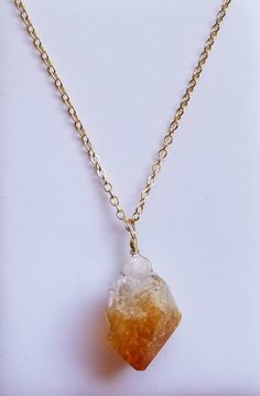 Raw Citrine Crystal Cluster Necklace, Orange Citrine Pendant Necklace, Gold Boho Bohemian Jewelry, Birthday Gift, Raw Stone Pendant Necklace This natural raw citrine cluster pendant necklace is suspended on a 14kt gold filled chain. Dress your jeans up with this stylish piece or wear long with your favorite sweater. This chic necklace goes great with just about anything. Whether a gift for yourself or your loved one, this necklace is sure to impress. This necklace also comes gift wrapped. Pendan Bohemian Birthstone Crystal Necklace For Healing, Spiritual Citrine Pendant Necklace, Spiritual Citrine Amber Necklace, Spiritual Citrine Birthstone Necklace, Orange Bohemian Crystal Necklace For Gift, Handmade Orange Jewelry For Birthday, Adjustable Citrine Necklaces For Healing, Amber Citrine Crystal Necklace As Gift, Amber Citrine Crystal Necklace For Gift