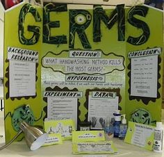 a table topped with lots of information about germs