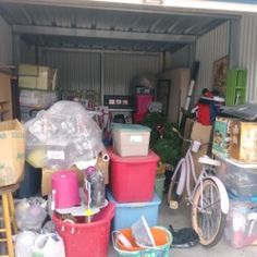 a garage filled with lots of boxes and containers