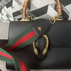 Pre-Loved, Dust Bag Included Gucci Top Handle Shoulder Bag With Dust Bag, Pre-owned Gucci Leather Shoulder Bag, Gucci Bag With Gold-tone Hardware And Top Handle, Pre-owned Luxury Gucci Shoulder Bag, Gucci Black Bag With Gold-tone Hardware, Top Handle, Gucci Dionysus, Gucci Bag, Dust Bag