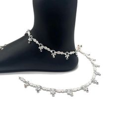 Name of product: 925 Sterling Silver Light Weight Anklet / Silver Payal Weight: 38.1 grams. Length: 26.9 centimeter  FREE EXPRESSS SHIPPING  -----Feedback::- A satisfied customer is our top priority and your feedback forms the backbone of our success. Don't forget to give positive feedback along with good ratings. Thank You Silver Toe Ring Anklets For Festivals, Silver Anklets With Latkans For Wedding, Silver Wedding Anklets With Latkans, White Metal Anklet Perfect For Gifting, White Metal Anklet As Gift, White Metal Anklets For Gift, Traditional White Anklets With Silver Beads, Elegant Silver Anklets With Latkans, Adjustable Silver Anklets For Festive Occasions