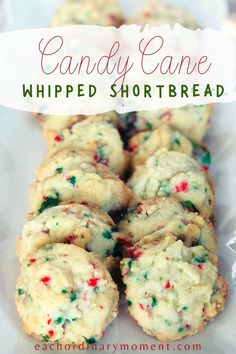 candy cane whipped shortbread cookies on a white plate with the words, candy cane whipped shortbread