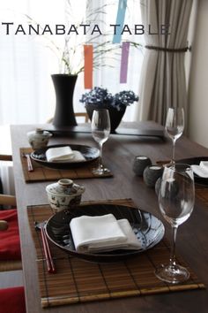 the table is set with place settings for two people