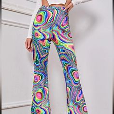 Multicolor Flare Leg Rave Pants Size Xs Never Worn And In Excellent Condition Should Fit Sizes Xs - S Super Vibrant And Perfect For Festivals Neon Rave Pants, Trendy Multicolor Full Length Bottoms, Multicolor Stretch Wide Leg Pants, Casual Colorful Wide Leg Bottoms, Stretch Multicolor Wide Leg Pants, Multicolor Stretch Wide Leg Bottoms, Trendy Colorful Bottoms For Spring, Trendy Colorful Spring Bottoms, Trendy Colorful Spring Pants