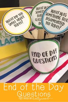 four cupcakes with words on them and the text end of the day questions